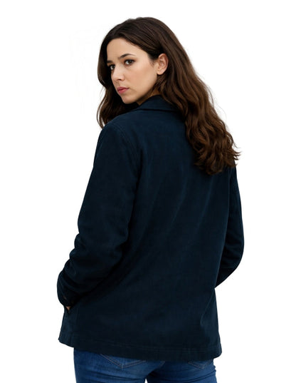 Woman wearing a dark blue jacket on a white background