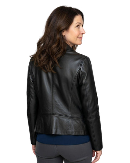 Woman wearing a black leather jacket on a white background