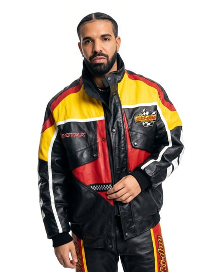 Man wearing a colorful racing suit with visible branding on a white background