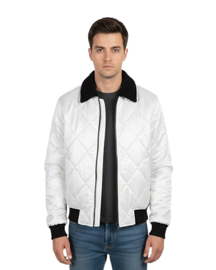 Man wearing a white quilted jacket with black accents on a white background