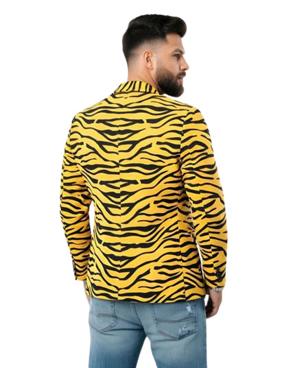 Man wearing a yellow and black zebra pattern shirt on a white background