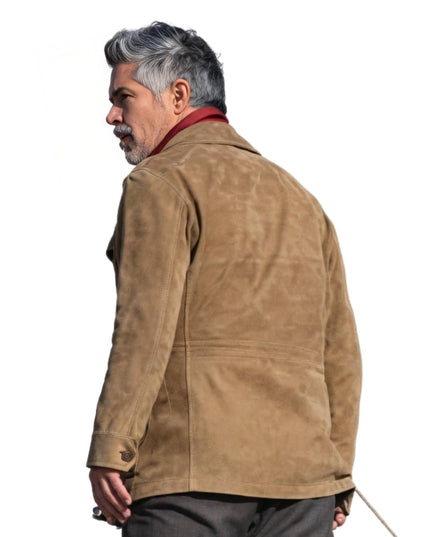 Man wearing a brown suede jacket on a white background