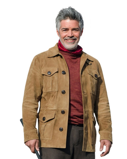 Man wearing a brown jacket over a red shirt on a white background