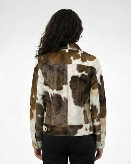 Person wearing a cowhide leather jacket on a white background