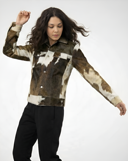 Woman wearing a cowhide patterned shirt on a white background