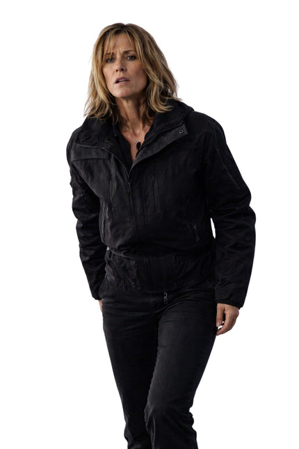 Woman wearing a black jacket on a white background