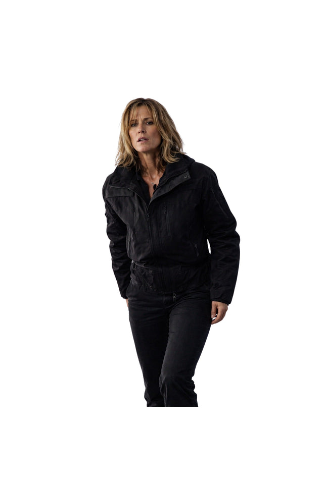 Woman wearing a black jacket on a white background