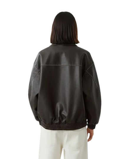 Person wearing a black leather jacket on a white background