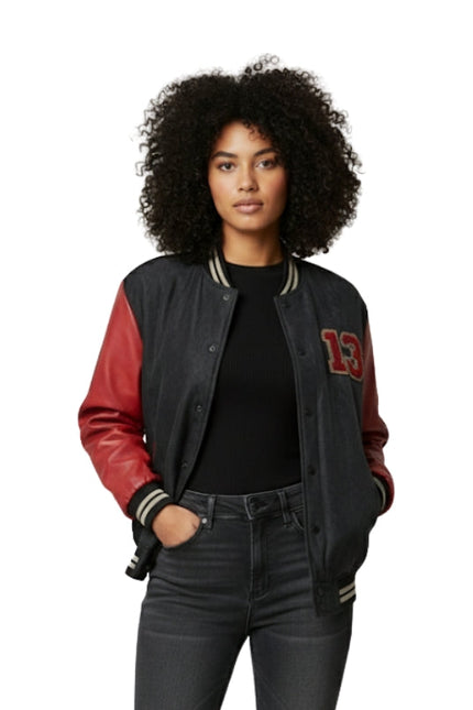 Person wearing a black and red varsity jacket with number 13 on a white background