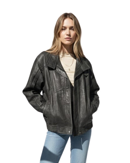 Woman wearing a black leather jacket on a white background