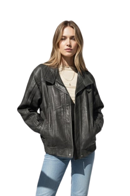 Woman wearing a black leather jacket on a white background