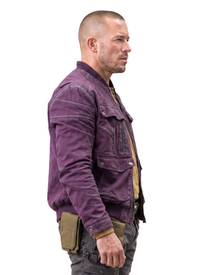 Man wearing a purple jacket with a white background