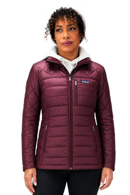 Women wearing maroon puffer jacket 