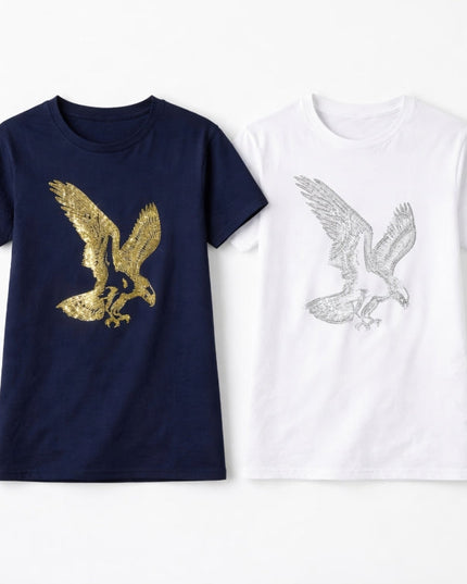 Navy blue t-shirt with gold eagle design and white t-shirt with silver eagle design on a white background