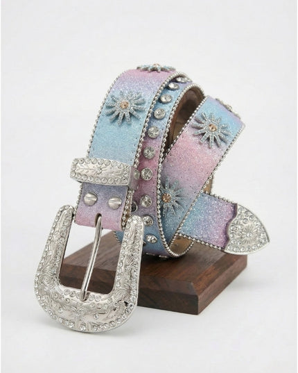 Decorative belt with floral designs and a silver buckle on a white background