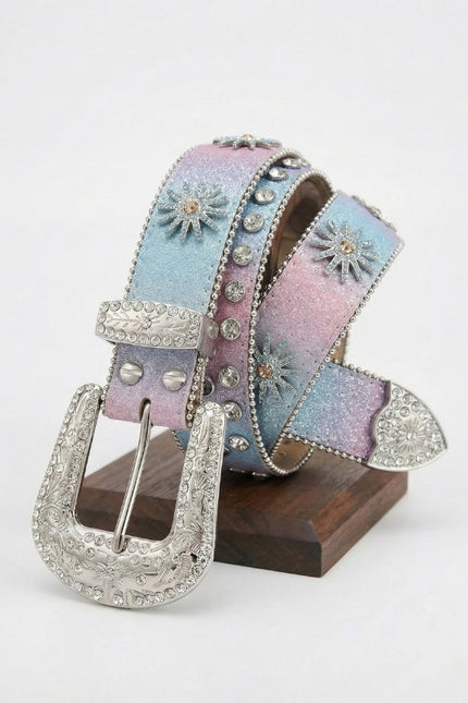 Decorative belt with floral designs and a silver buckle on a white background