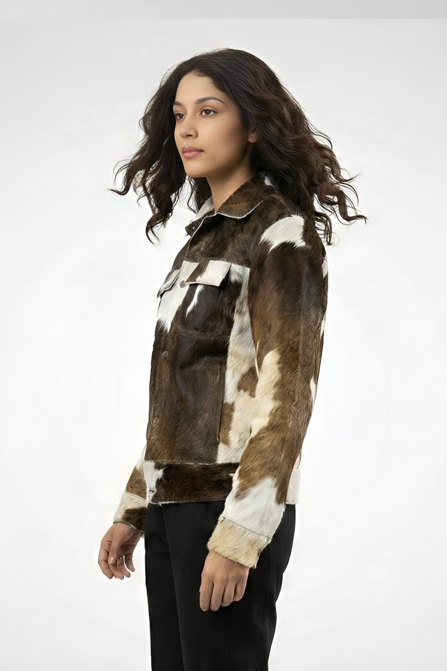 Woman wearing a cowhide leather jacket on a white background