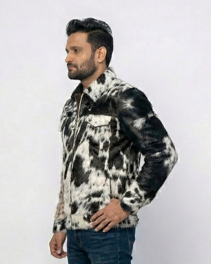 Man wearing a black and white patterned jacket on a white background