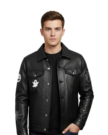 Man wearing a black leather jacket with ghost and spider web designs on sleeves against a white background