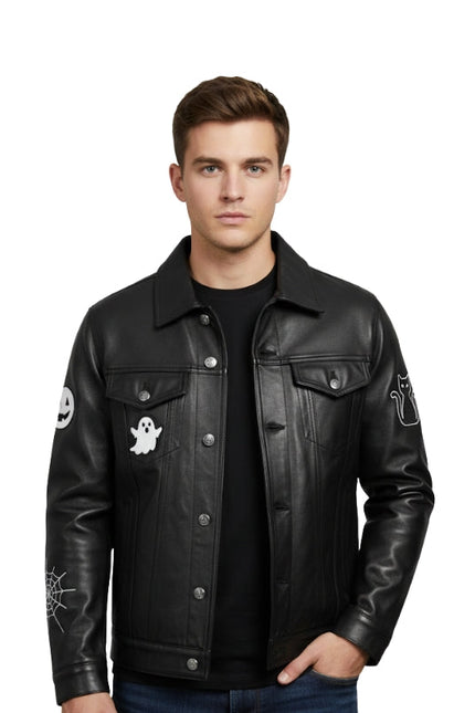 Man wearing a black leather jacket with ghost and spider web designs on sleeves against a white background