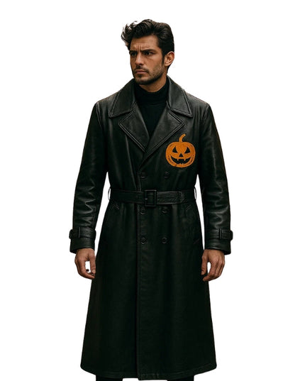 Man wearing a black coat with a pumpkin design on a white background