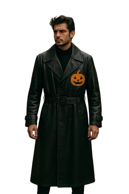 Man wearing a black coat with a pumpkin design on a white background