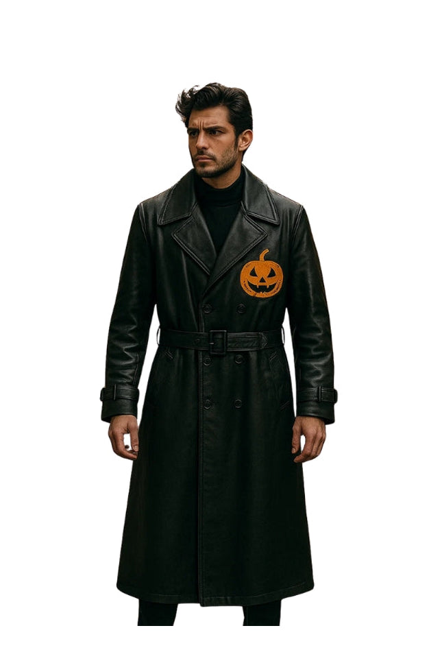 Man wearing a black coat with a pumpkin design on a white background