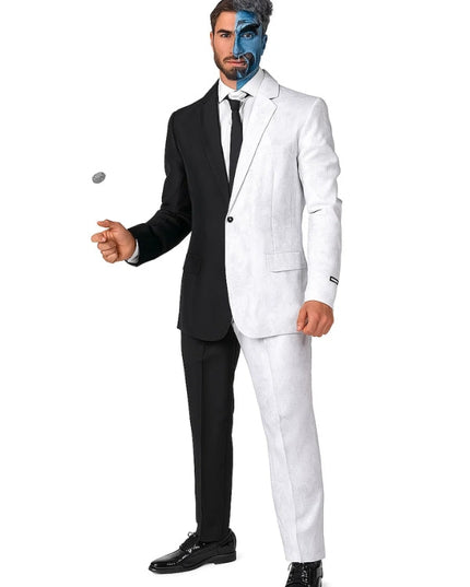 Man wearing a black and white suit with a face painted in blue and gray.