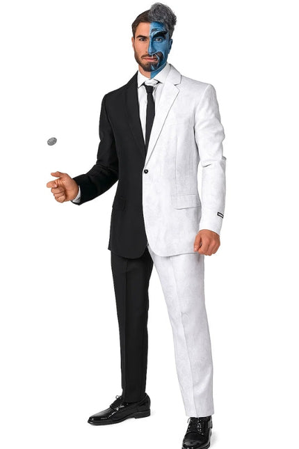 Man wearing a black and white suit with a face painted in blue and gray.