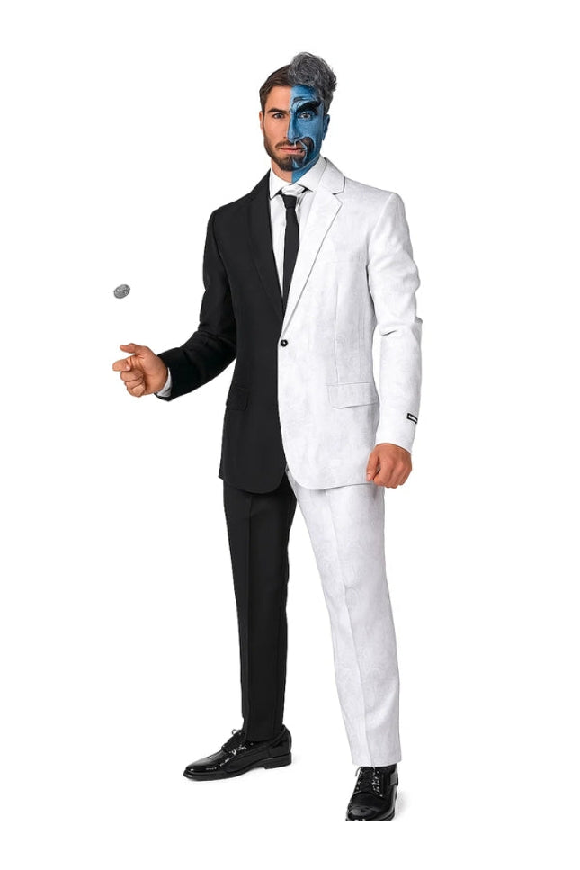 Man wearing a black and white suit with a face painted in blue and gray.