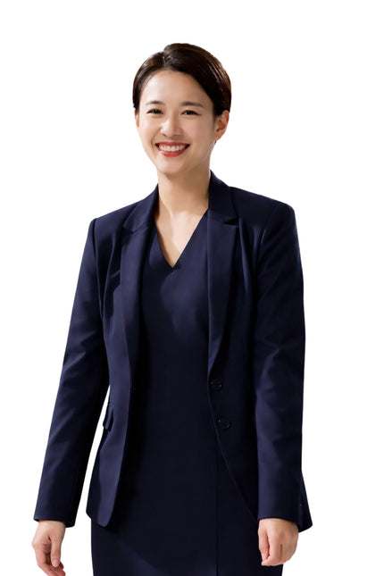 Woman wearing a navy blue suit on a white background