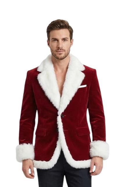 Man wearing a red velvet blazer with white fur trim on a white background