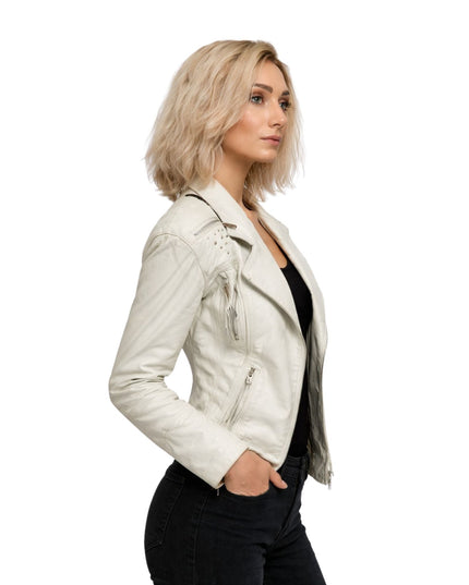 Woman wearing a white leather jacket on a white background