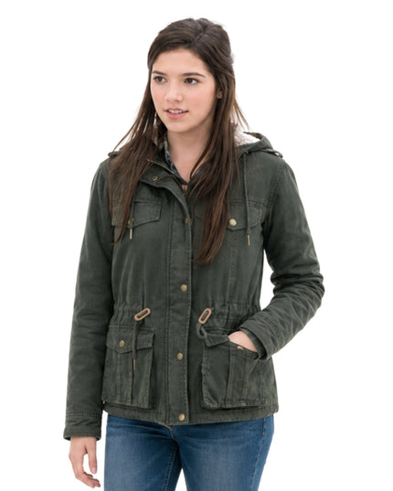 Woman wearing a green jacket on a white background