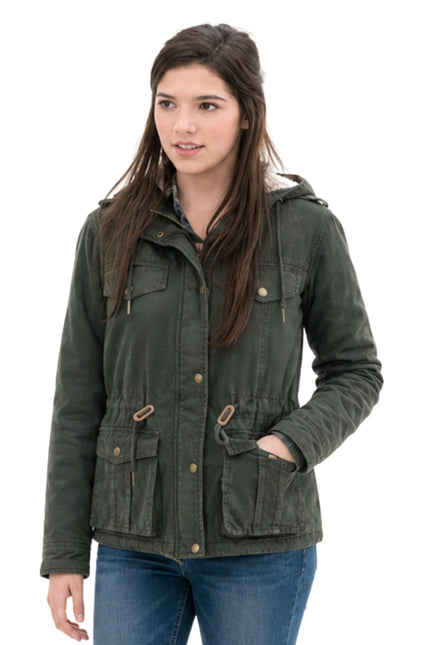 Woman wearing a green jacket on a white background