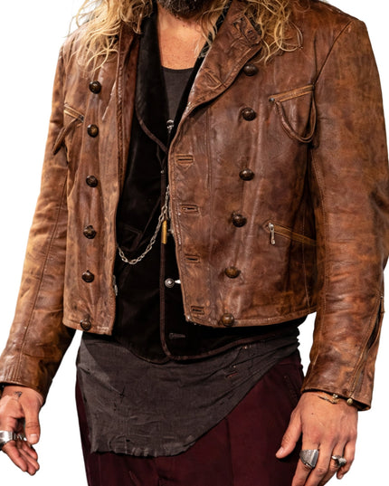 Brown leather jacket worn by a person on a white background