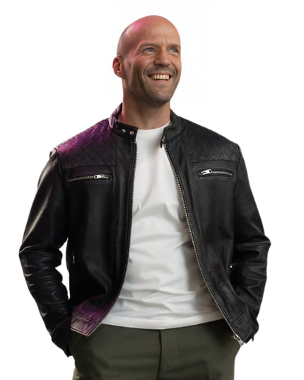 Man wearing a black leather jacket with purple accents on a white background