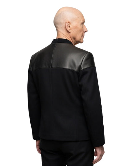 Person wearing a black leather jacket on a white background