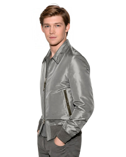 Man wearing a grey bomber jacket on a white background 