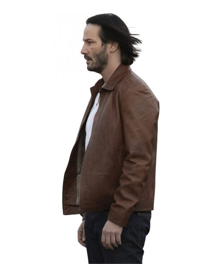Person Wearing a white t-shirt with a brown leather jacket 