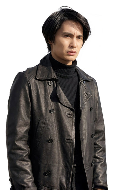 Man wearing a dark leather coat over a black turtleneck on a white background