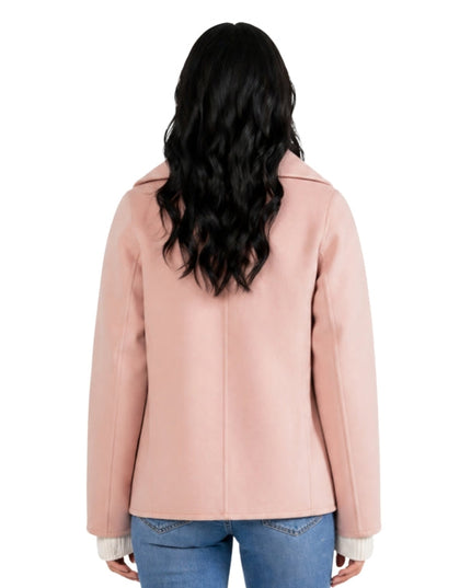 Woman wearing a pink wool fabric pea coat 
