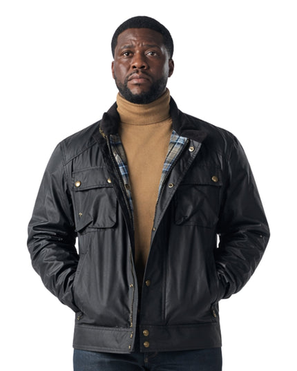 Man wearing a black jacket with plaid lining on a white background