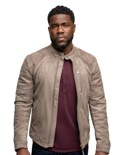 Man wearing a beige leather jacket over a maroon shirt on a white background