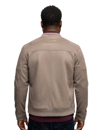 Man wearing a beige jacket on a white background