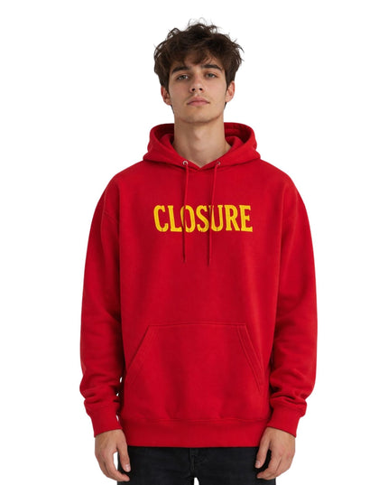 Red hoodie with 'CLOSURE' text worn by a person on a white background