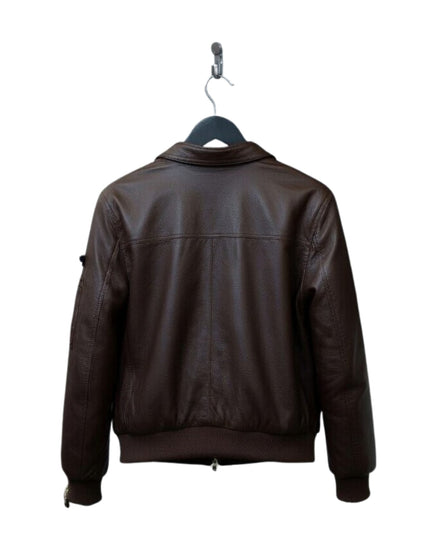 Brown leather jacket on a hanger against a white background