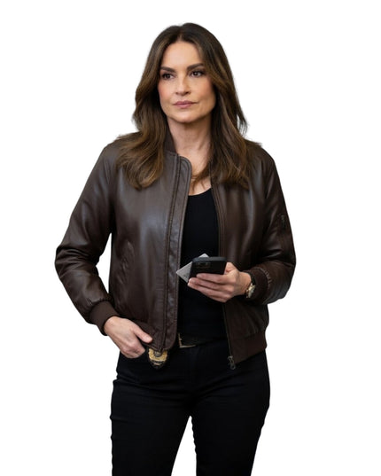 Woman wearing a brown leather jacket on a white background
