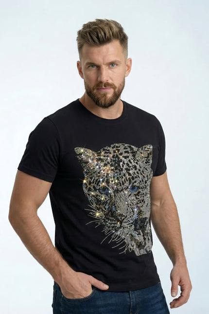 Man wearing a black t-shirt with a sequined leopard design on a light gray background