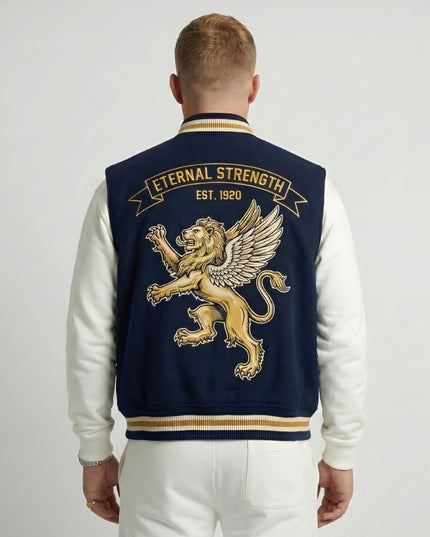 Man wearing a navy blue letterman jacket with gold lion emblem and 'Eternal Strength' text on the back.